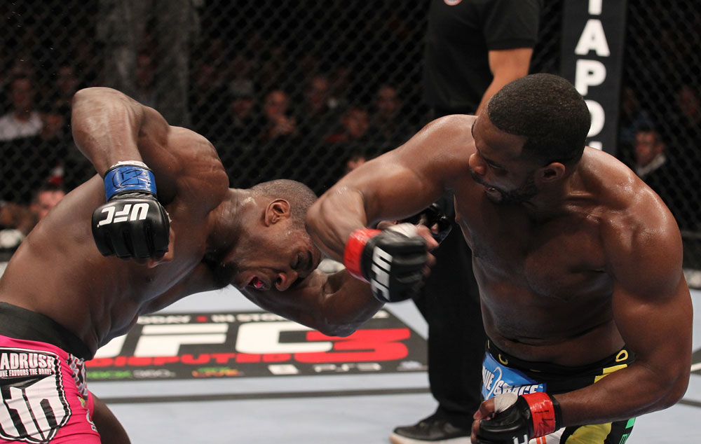 CHICAGO, IL - JANUARY 28:  (R-L) Rashad Evans punches Phil Davis during the UFC on FOX event at United Center on January 28, 2012 in Chicago, Illinois.  (Photo by Nick Laham/Zuffa LLC/Zuffa LLC via Getty Images) *** Local Caption *** Rashad Evans; Phil Davis