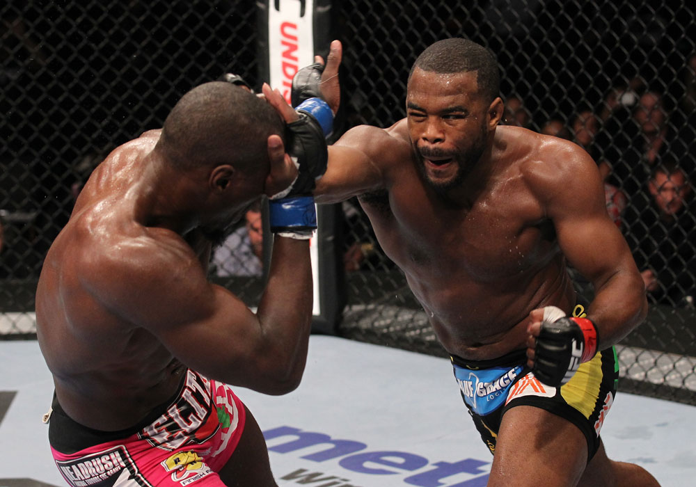 CHICAGO, IL - JANUARY 28:  (R-L) Rashad Evans punches Phil Davis during the UFC on FOX event at United Center on January 28, 2012 in Chicago, Illinois.  (Photo by Nick Laham/Zuffa LLC/Zuffa LLC via Getty Images) *** Local Caption *** Rashad Evans; Phil Davis