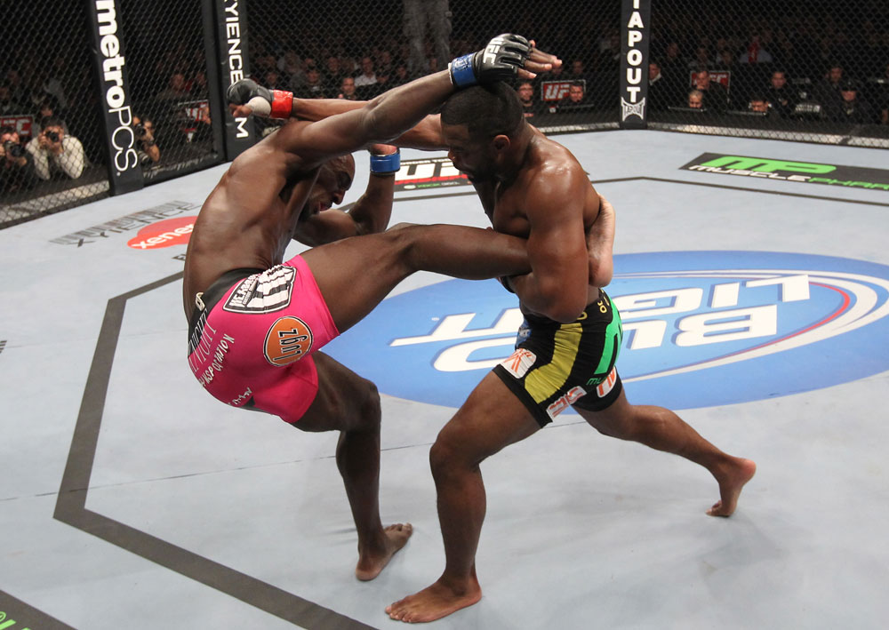 CHICAGO, IL - JANUARY 28:  (R-L) Rashad Evans punches Phil Davis during the UFC on FOX event at United Center on January 28, 2012 in Chicago, Illinois.  (Photo by Nick Laham/Zuffa LLC/Zuffa LLC via Getty Images) *** Local Caption *** Rashad Evans; Phil Davis