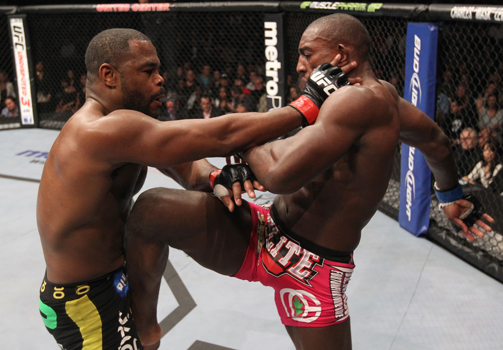 CHICAGO, IL - JANUARY 28:  (R-L) Phil Davis devlivers a knee strike against Rashad Evans during the UFC on FOX event at United Center on January 28, 2012 in Chicago, Illinois.  (Photo by Nick Laham/Zuffa LLC/Zuffa LLC via Getty Images) *** Local Caption *** Rashad Evans; Phil Davis