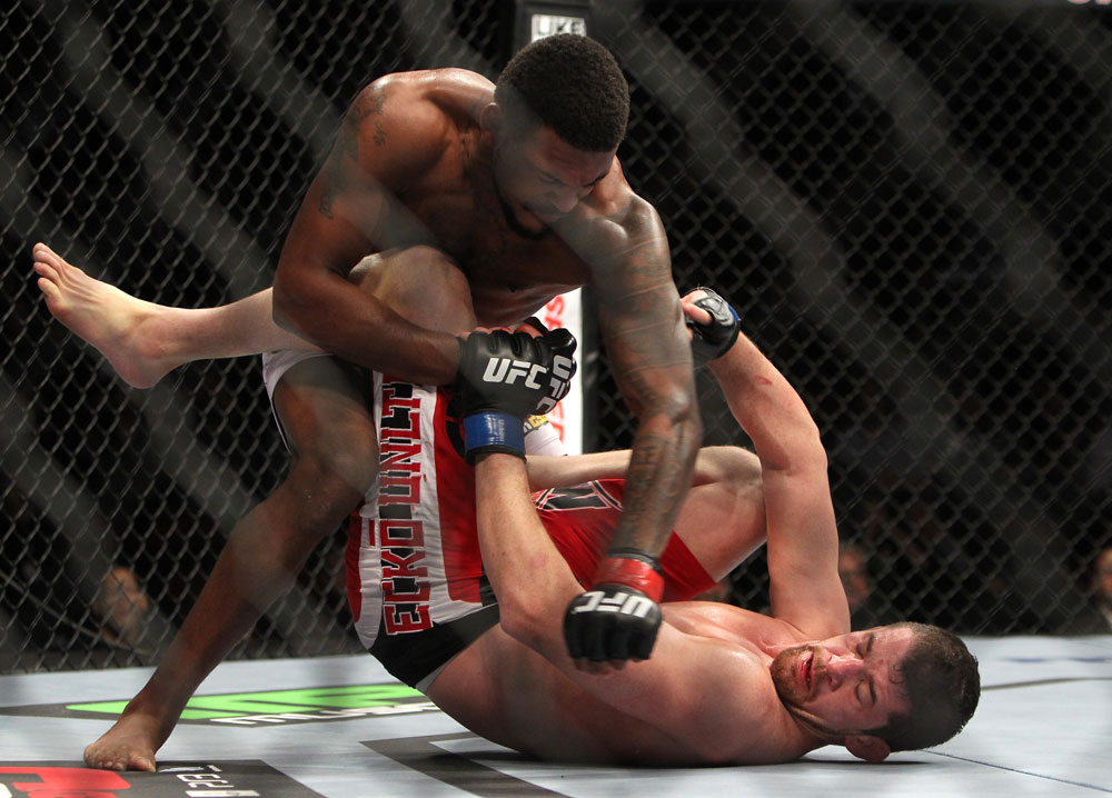 CHICAGO, IL - JANUARY 28:  (L-R) Michael Johnson punches Shane Roller during the UFC on FOX event at United Center on January 28, 2012 in Chicago, Illinois.  (Photo by Josh Hedges/Zuffa LLC/Zuffa LLC via Getty Images) *** Local Caption *** Michael Johnson; Shane Roller