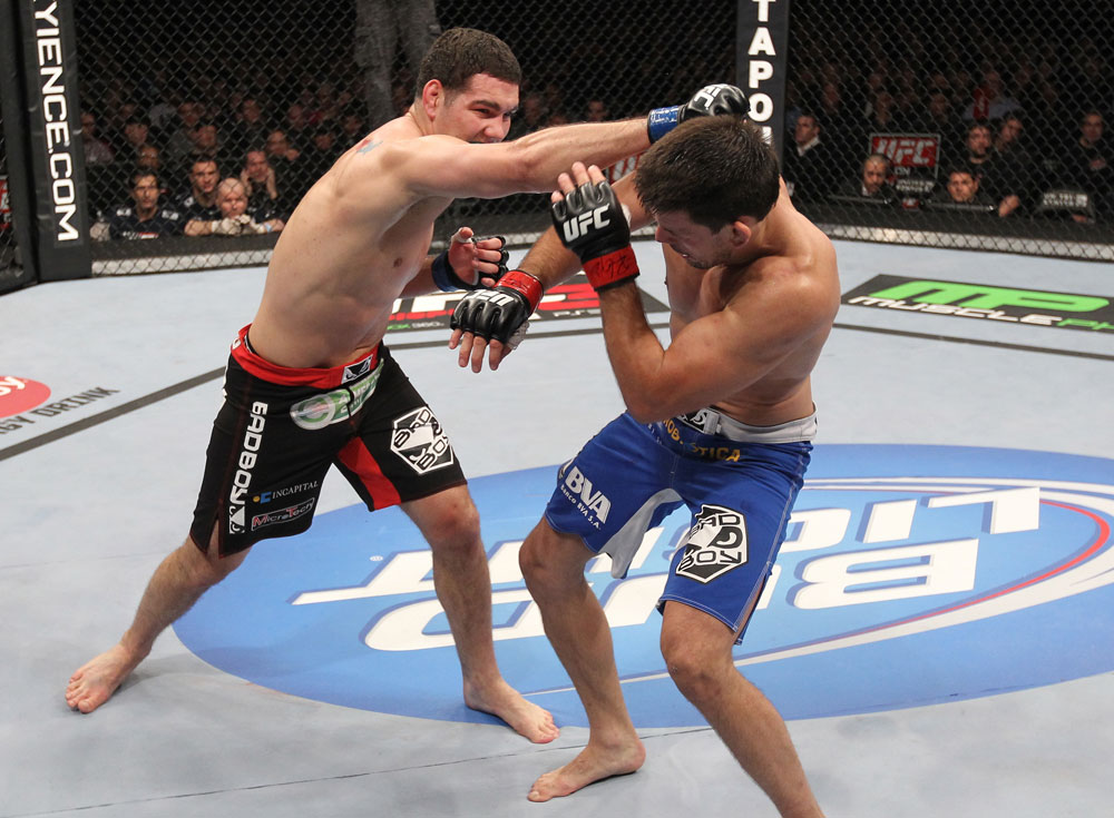 CHICAGO, IL - JANUARY 28:  (L-R) Chris Weidman punches Demian Maia during the UFC on FOX event at United Center on January 28, 2012 in Chicago, Illinois.  (Photo by Nick Laham/Zuffa LLC/Zuffa LLC via Getty Images) *** Local Caption *** Chris Weidman; Demian Maia