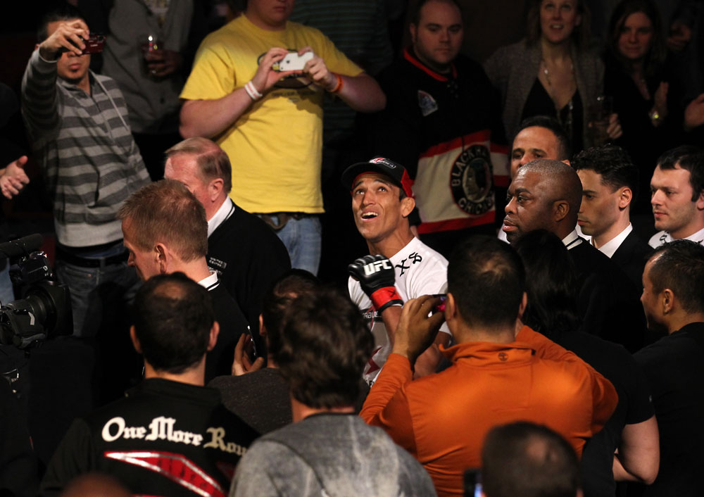 CHICAGO, IL - JANUARY 28:  Charles Oliveira enters the arena before his bout against Eric Wisely during the UFC on FOX event at United Center on January 28, 2012 in Chicago, Illinois.  (Photo by Nick Laham/Zuffa LLC/Zuffa LLC via Getty Images) *** Local Caption *** Charles Oliveira
