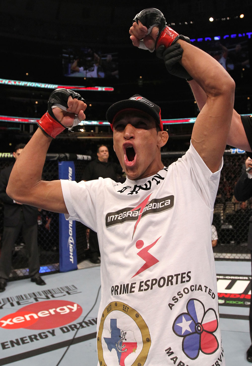 CHICAGO, IL - JANUARY 28:  Charles Oliveira reacts after defeating Eric Wisely by submission during the UFC on FOX event at United Center on January 28, 2012 in Chicago, Illinois.  (Photo by Nick Laham/Zuffa LLC/Zuffa LLC via Getty Images) *** Local Caption *** Charles Oliveira