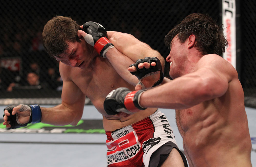 CHICAGO, IL - JANUARY 28:  (R-L) Chael Sonnen punches Michael Bisping during the UFC on FOX event at United Center on January 28, 2012 in Chicago, Illinois.  (Photo by Nick Laham/Zuffa LLC/Zuffa LLC via Getty Images) *** Local Caption *** Chael Sonnen; Michael Bisping
