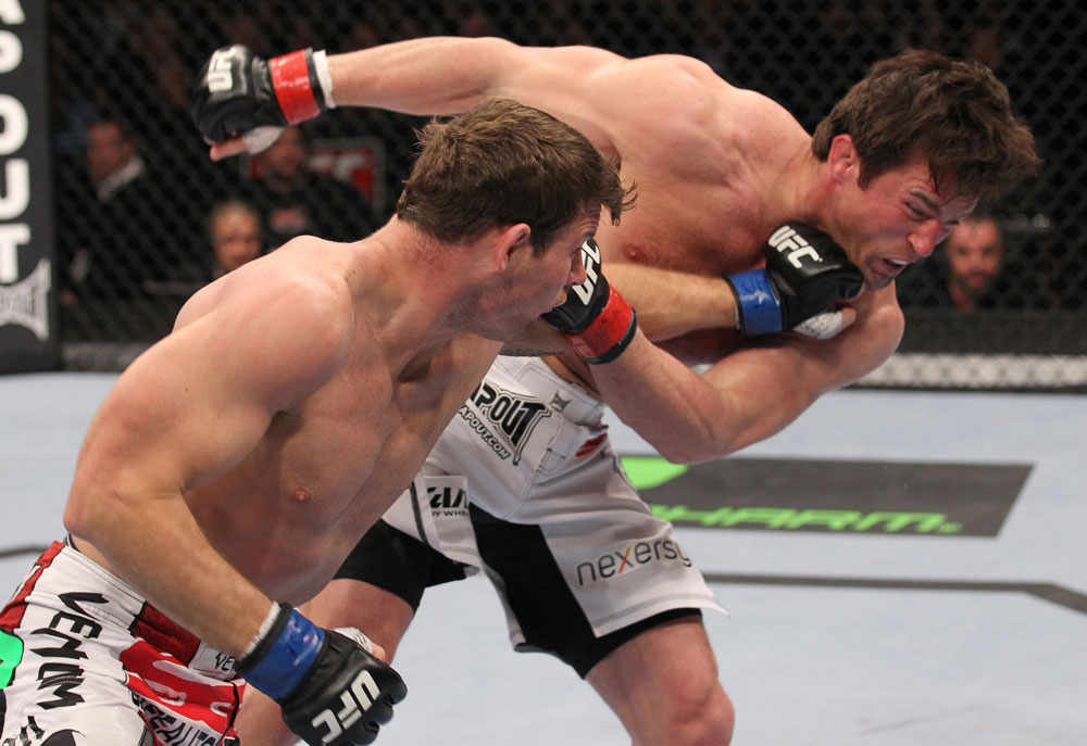 CHICAGO, IL - JANUARY 28:  (L-R) Michael Bisping punches Chael Sonnen during the UFC on FOX event at United Center on January 28, 2012 in Chicago, Illinois.  (Photo by Nick Laham/Zuffa LLC/Zuffa LLC via Getty Images) *** Local Caption *** Chael Sonnen; Michael Bisping