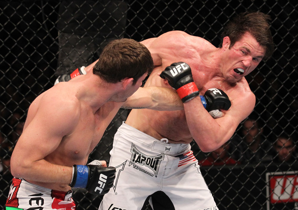 CHICAGO, IL - JANUARY 28:  (L-R) Michael Bisping punches Chael Sonnen during the UFC on FOX event at United Center on January 28, 2012 in Chicago, Illinois.  (Photo by Nick Laham/Zuffa LLC/Zuffa LLC via Getty Images) *** Local Caption *** Chael Sonnen; Michael Bisping