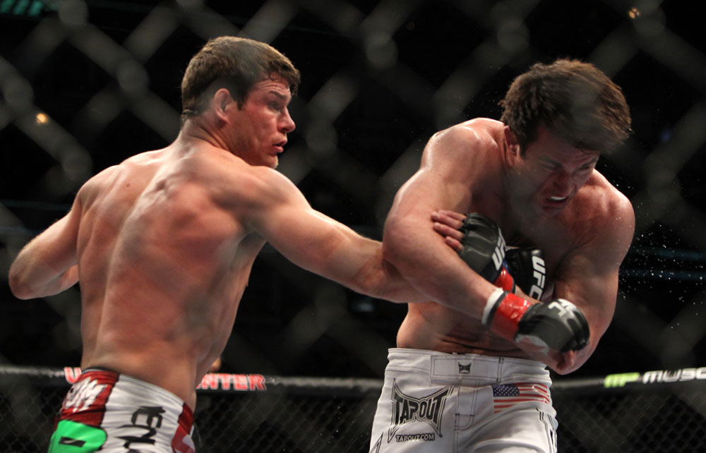CHICAGO, IL - JANUARY 28:  (L-R) Michael Bisping punches Chael Sonnen during the UFC on FOX event at United Center on January 28, 2012 in Chicago, Illinois.  (Photo by Josh Hedges/Zuffa LLC/Zuffa LLC via Getty Images) *** Local Caption *** Chael Sonnen; Michael Bisping
