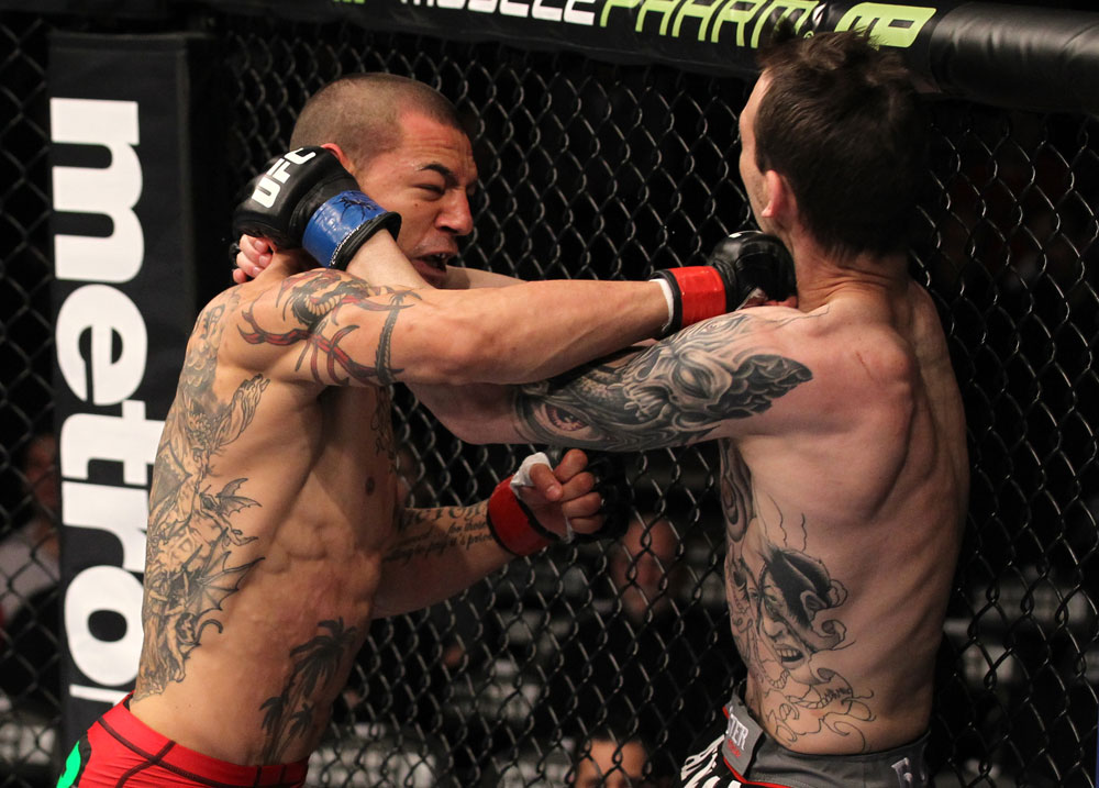 CHICAGO, IL - JANUARY 28:  (L-R) Cub Swanson punches George Roop during the UFC on FOX event at United Center on January 28, 2012 in Chicago, Illinois.  (Photo by Nick Laham/Zuffa LLC/Zuffa LLC via Getty Images) *** Local Caption *** George Roop; Cub Swanson