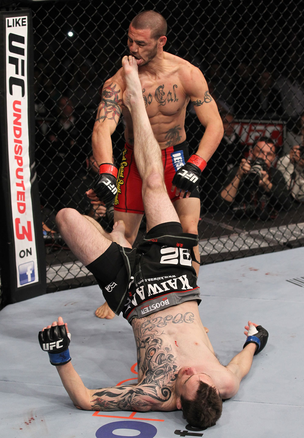 CHICAGO, IL - JANUARY 28:  George Roop kicks up at Cub Swanson from the bottom during the UFC on FOX event at United Center on January 28, 2012 in Chicago, Illinois.  (Photo by Nick Laham/Zuffa LLC/Zuffa LLC via Getty Images) *** Local Caption *** Cub Swanson; George Roop