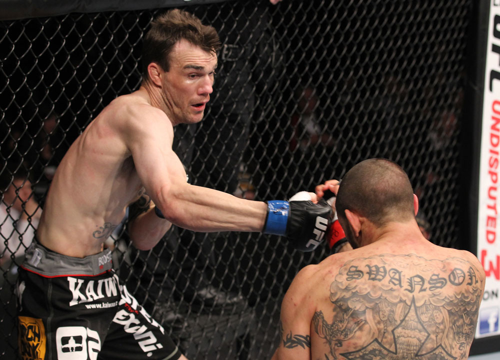 CHICAGO, IL - JANUARY 28:  (L-R) George Roop punches Cub Swanson from the bottom during the UFC on FOX event at United Center on January 28, 2012 in Chicago, Illinois.  (Photo by Nick Laham/Zuffa LLC/Zuffa LLC via Getty Images) *** Local Caption *** Cub Swanson; George Roop