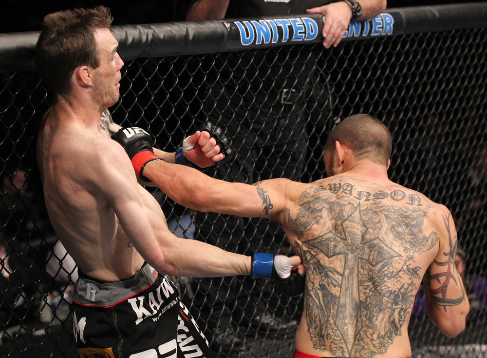 CHICAGO, IL - JANUARY 28:  (L-R) George Roop and Cub Swanson trade punches during the UFC on FOX event at United Center on January 28, 2012 in Chicago, Illinois.  (Photo by Nick Laham/Zuffa LLC/Zuffa LLC via Getty Images) *** Local Caption *** Cub Swanson; George Roop