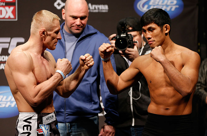 SEATTLE, WA - DECEMBER 07:  (L-R) Opponents Dennis Siver and Nam Phan face off during the official UFC on FOX weigh in on December 7, 2012 at Key Arena in Seattle, Washington.  (Photo by Josh Hedges/Zuffa LLC/Zuffa LLC via Getty Images)