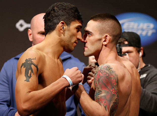 SEATTLE, WA - DECEMBER 07:  (L-R) Opponents Ramsey Nijem and Joe Proctor face off during the official UFC on FOX weigh in on December 7, 2012 at Key Arena in Seattle, Washington.  (Photo by Josh Hedges/Zuffa LLC/Zuffa LLC via Getty Images)