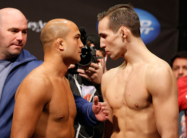 SEATTLE, WA - DECEMBER 07:  (L-R) Opponents BJ Penn and Rory MacDonald face off during the official UFC on FOX weigh in on December 7, 2012 at Key Arena in Seattle, Washington.  (Photo by Josh Hedges/Zuffa LLC/Zuffa LLC via Getty Images)
