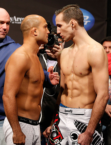 SEATTLE, WA - DECEMBER 07:  (L-R) Opponents BJ Penn and Rory MacDonald face off during the official UFC on FOX weigh in on December 7, 2012 at Key Arena in Seattle, Washington.  (Photo by Josh Hedges/Zuffa LLC/Zuffa LLC via Getty Images)