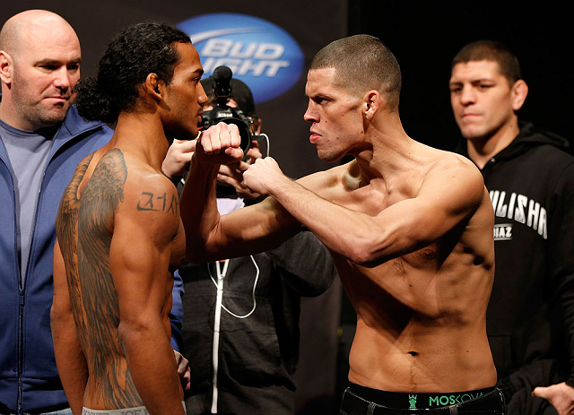 SEATTLE, WA - DECEMBER 07:  (L-R) Opponents Benson Henderson and Nate Diaz face off during the official UFC on FOX weigh in on December 7, 2012 at Key Arena in Seattle, Washington.  (Photo by Josh Hedges/Zuffa LLC/Zuffa LLC via Getty Images)