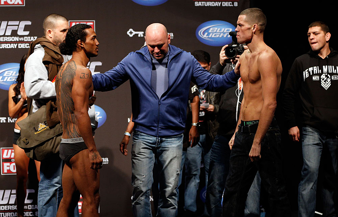 SEATTLE, WA - DECEMBER 07:  UFC President Dana White (center) separates opponents Benson Henderson (L) and Nate Diaz &Acirc;&reg; during the official UFC on FOX weigh in on December 7, 2012 at Key Arena in Seattle, Washington.  (Photo by Josh Hedges/Zuffa LLC/Zuffa LLC via Getty Images)
