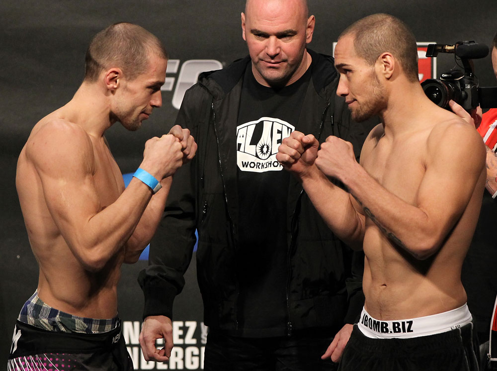 OMAHA, NE - FEBRUARY 14:  (L-R) Opponents Anton Kuivanen and Justin Salas face off after weighing in during the UFC on FUEL TV weigh in event at Omaha Civic Auditorium on February 14, 2012 in Omaha, Nebraska.  (Photo by Josh Hedges/Zuffa LLC/Zuffa LLC via Getty Images) *** Local Caption *** Anton Kuivanen; Justin Salas; Dana White