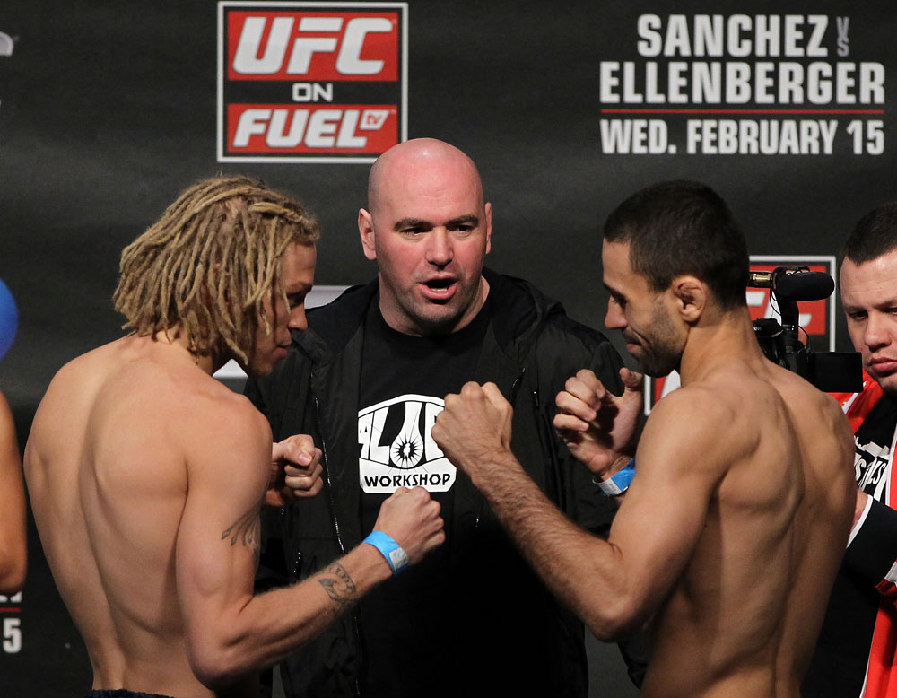 OMAHA, NE - FEBRUARY 14:  (L-R) Featherweight opponents Jonathan Brookins and Vagner Rocha face off after weighing in during the UFC on FUEL TV weigh in event at Omaha Civic Auditorium on February 14, 2012 in Omaha, Nebraska.  (Photo by Josh Hedges/Zuffa LLC/Zuffa LLC via Getty Images) *** Local Caption *** Vagner Rocha; Jonathan Brookins; Dana White