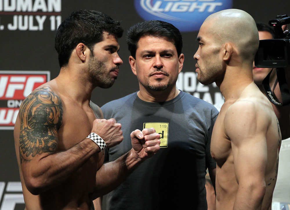 SAN JOSE, CA - JULY 10:   (L-R) Opponents Raphael Assuncao and Issei Tamura face off during the UFC on Fuel TV weigh in at HP Pavilion on July 10, 2012 in San Jose, California.  (Photo by Josh Hedges/Zuffa LLC/Zuffa LLC via Getty Images)