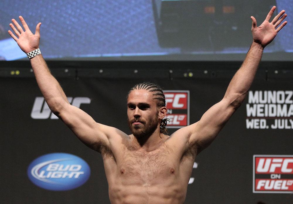 SAN JOSE, CA - JULY 10:   Andrew Craig makes weight during the UFC on Fuel TV weigh in at HP Pavilion on July 10, 2012 in San Jose, California.  (Photo by Josh Hedges/Zuffa LLC/Zuffa LLC via Getty Images)