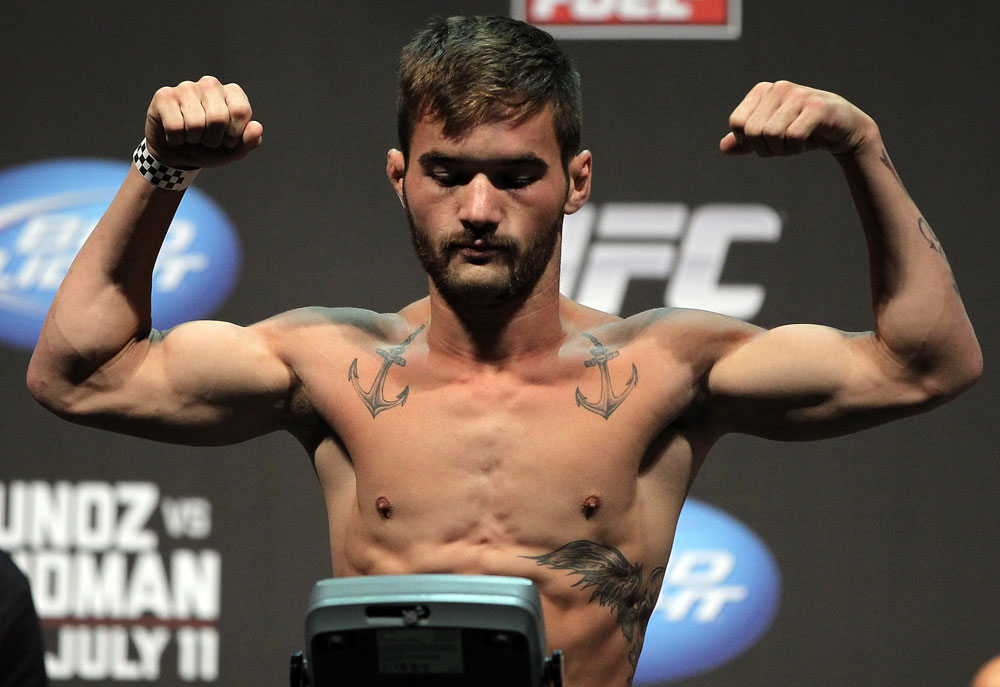 SAN JOSE, CA - JULY 10:   Josh Ferguson makes weight during the UFC on Fuel TV weigh in at HP Pavilion on July 10, 2012 in San Jose, California.  (Photo by Josh Hedges/Zuffa LLC/Zuffa LLC via Getty Images)