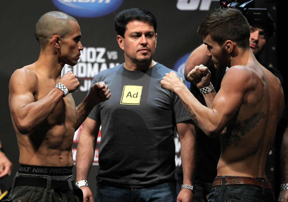 SAN JOSE, CA - JULY 10:   (L-R) Opponents Chris Cariaso and Josh Ferguson face off during the UFC on Fuel TV weigh in at HP Pavilion on July 10, 2012 in San Jose, California.  (Photo by Josh Hedges/Zuffa LLC/Zuffa LLC via Getty Images)