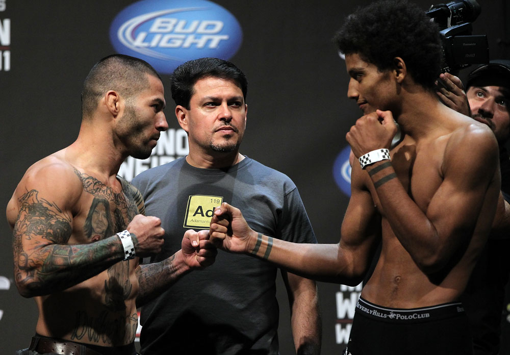SAN JOSE, CA - JULY 10:   (L-R) Opponents Damacio Page and Alex Caceres face off during the UFC on Fuel TV weigh in at HP Pavilion on July 10, 2012 in San Jose, California.  (Photo by Josh Hedges/Zuffa LLC/Zuffa LLC via Getty Images)