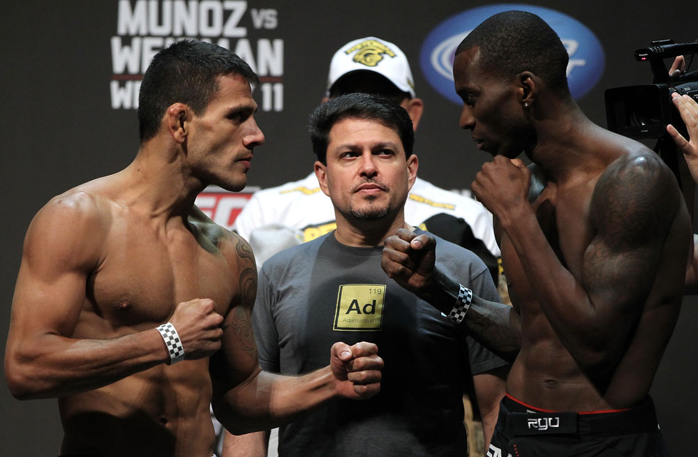SAN JOSE, CA - JULY 10:   (L-R) Opponents Rafael Dos Anjos and Anthony Njokuani face off during the UFC on Fuel TV weigh in at HP Pavilion on July 10, 2012 in San Jose, California.  (Photo by Josh Hedges/Zuffa LLC/Zuffa LLC via Getty Images)