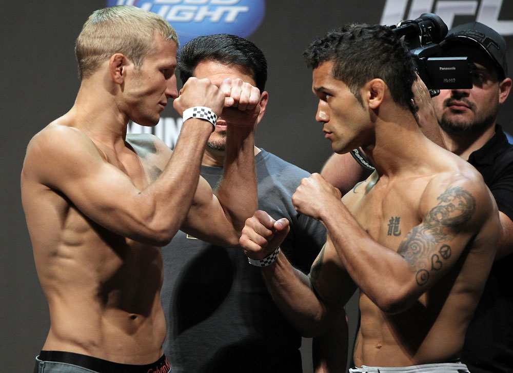 SAN JOSE, CA - JULY 10:   (L-R) Opponents T.J. Dillashaw and Vaughn Lee face off during the UFC on Fuel TV weigh in at HP Pavilion on July 10, 2012 in San Jose, California.  (Photo by Josh Hedges/Zuffa LLC/Zuffa LLC via Getty Images)