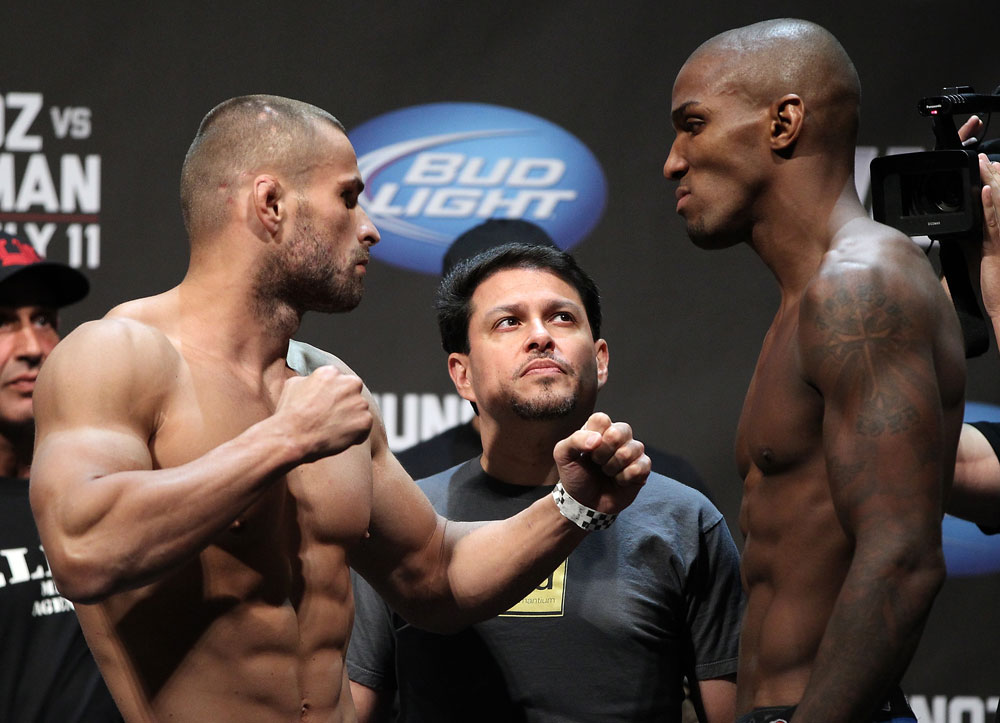 SAN JOSE, CA - JULY 10:   (L-R) Opponents Karlos Vemola and Francis Carmont face off during the UFC on Fuel TV weigh in at HP Pavilion on July 10, 2012 in San Jose, California.  (Photo by Josh Hedges/Zuffa LLC/Zuffa LLC via Getty Images)