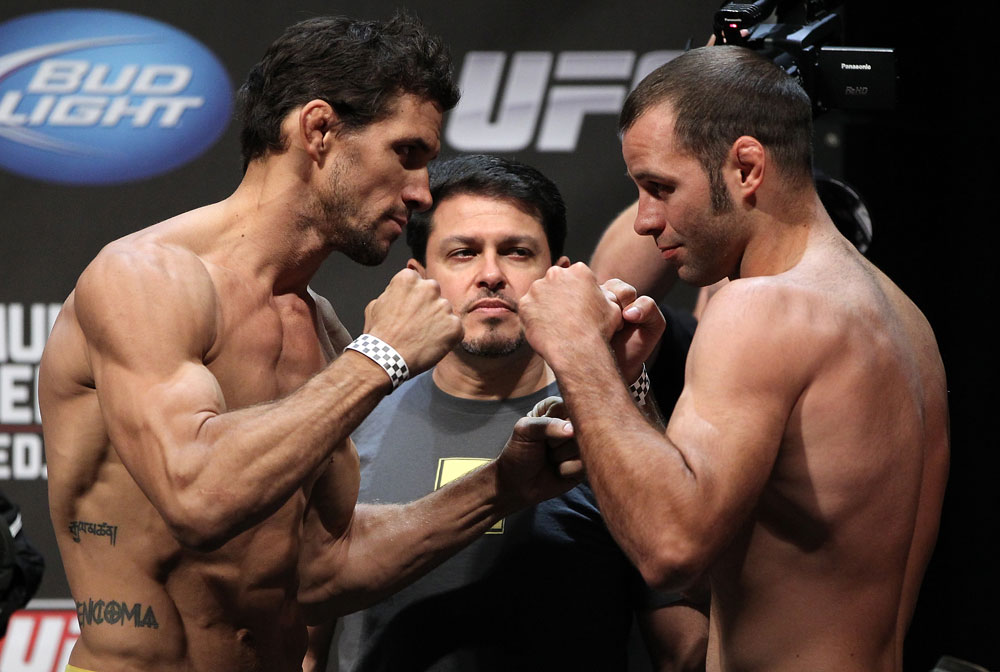 SAN JOSE, CA - JULY 10:   (L-R) Opponents Aaron Simpson and Kenny Robertson face off during the UFC on Fuel TV weigh in at HP Pavilion on July 10, 2012 in San Jose, California.  (Photo by Josh Hedges/Zuffa LLC/Zuffa LLC via Getty Images)