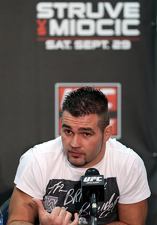 NOTTINGHAM, ENGLAND - SEPTEMBER 27:  John Maguire interacts with media during a UFC press conference at the Hilton Hotel on September 27, 2012 in Nottingham, England.  (Photo by Josh Hedges/Zuffa LLC/Zuffa LLC via Getty Images)