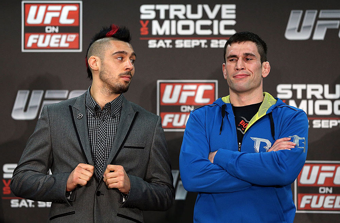 NOTTINGHAM, ENGLAND - SEPTEMBER 27:  (L-R) Opponents Dan Hardy and Amir Sadollah pose for photos during a UFC press conference at the Hilton Hotel on September 27, 2012 in Nottingham, England.  (Photo by Josh Hedges/Zuffa LLC/Zuffa LLC via Getty Images)