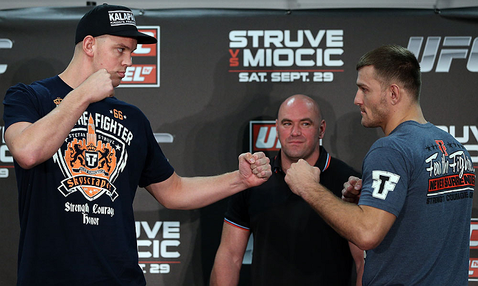 NOTTINGHAM, ENGLAND - SEPTEMBER 27:  (L-R) Opponents Stefan Struve and Stipe Miocic face off during a UFC press conference at the Hilton Hotel on September 27, 2012 in Nottingham, England.  (Photo by Josh Hedges/Zuffa LLC/Zuffa LLC via Getty Images)