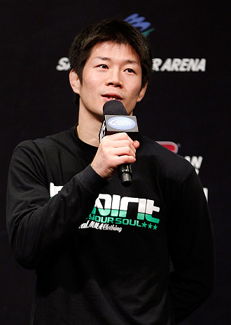 SAITAMA, JAPAN - MARCH 02: Hatsu Hioki interacts with fans during a Q&A session before the UFC on FUEL TV weigh-in at Saitama Super Arena on March 2, 2013 in Saitama, Japan. (Photo by Josh Hedges/Zuffa LLC/Zuffa LLC via Getty Images)