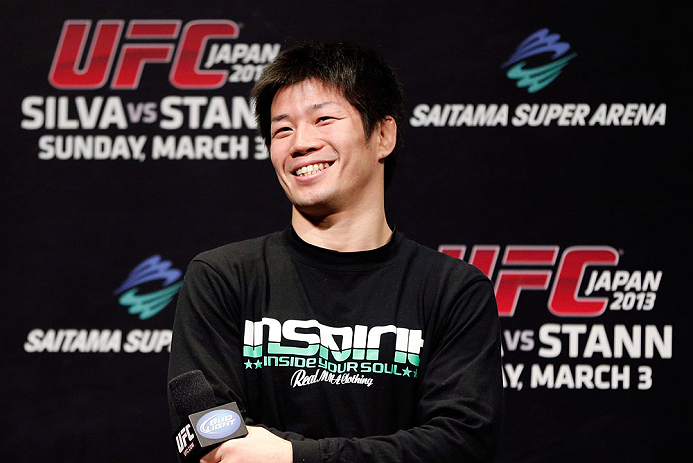 SAITAMA, JAPAN - MARCH 02: Hatsu Hioki interacts with fans during a Q&A session before the UFC on FUEL TV weigh-in at Saitama Super Arena on March 2, 2013 in Saitama, Japan. (Photo by Josh Hedges/Zuffa LLC/Zuffa LLC via Getty Images)