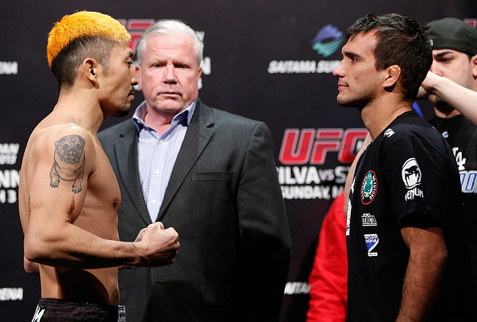 SAITAMA, JAPAN - MARCH 02: (L-R) Opponents Mizuto Hirota and Rani Yahya face off during the UFC on FUEL TV weigh-in at Saitama Super Arena on March 2, 2013 in Saitama, Japan. (Photo by Josh Hedges/Zuffa LLC/Zuffa LLC via Getty Images)