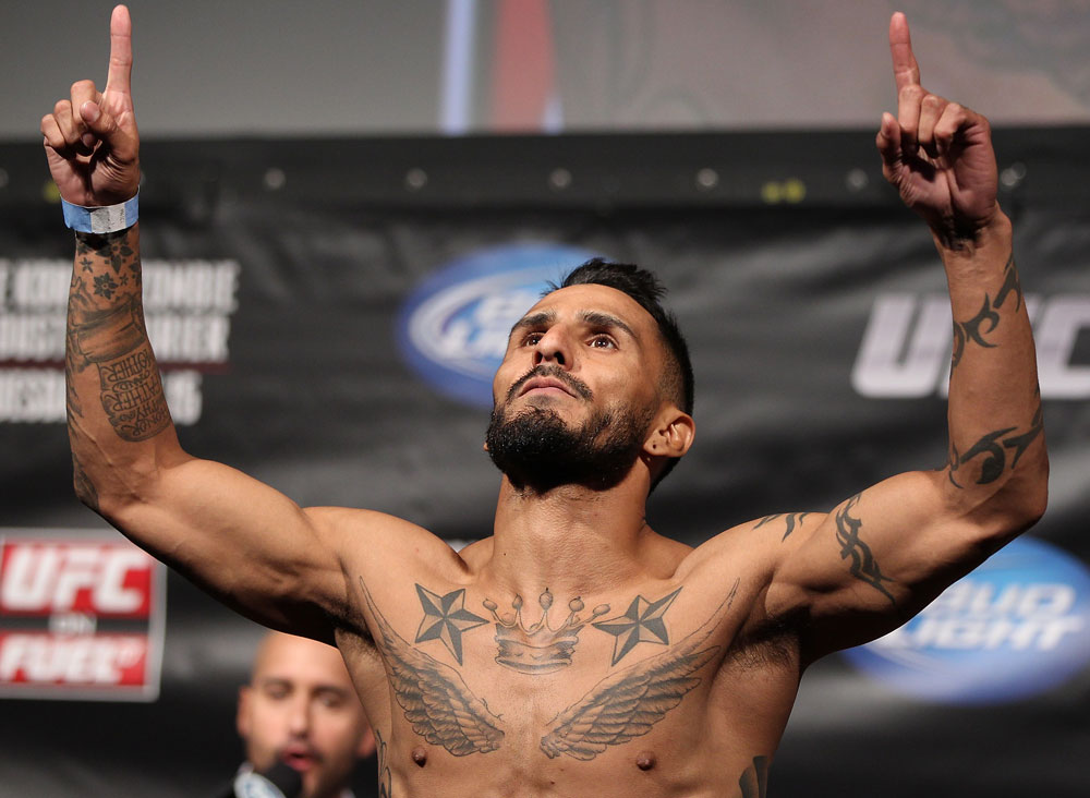 FAIRFAX, VA - MAY 14:  Francisco Rivera makes weight during the UFC on Fuel TV official weigh in at Patriot Center on May 14, 2012 in Fairfax, Virginia.  (Photo by Josh Hedges/Zuffa LLC/Zuffa LLC via Getty Images)