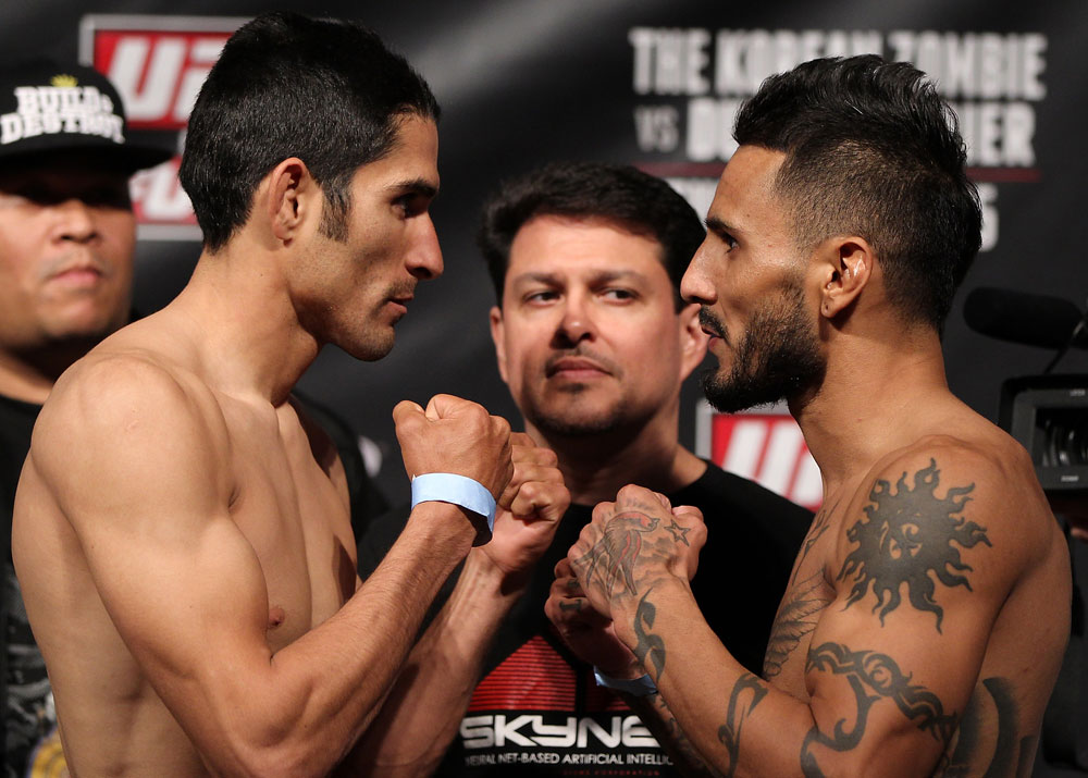 FAIRFAX, VA - MAY 14: (L-R) Opponents Alex Soto and Francisco Rivera face off after weighing in during the UFC on Fuel TV official weigh in at Patriot Center on May 14, 2012 in Fairfax, Virginia. (Photo by Josh Hedges/Zuffa LLC/Zuffa LLC via Getty Images)