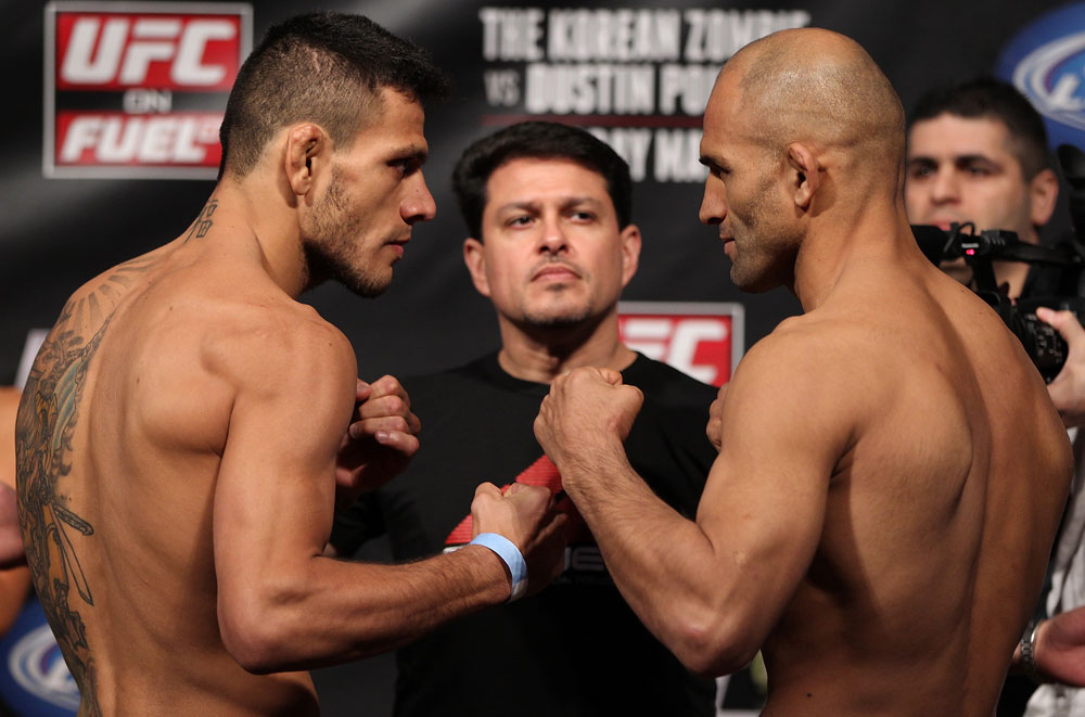 FAIRFAX, VA - MAY 14:  (L-R) Lightweight opponents Rafael Dos Anjos and Kamal Shalorus face off after weighing in during the UFC on Fuel TV official weigh in at Patriot Center on May 14, 2012 in Fairfax, Virginia.  (Photo by Josh Hedges/Zuffa LLC/Zuffa LLC via Getty Images)