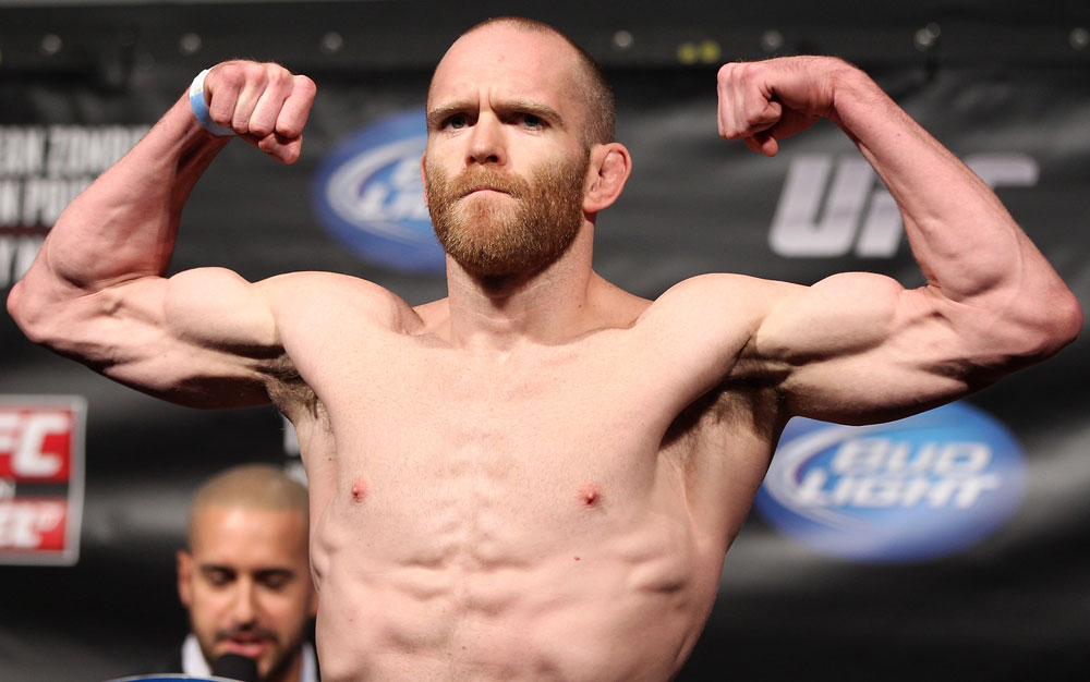 FAIRFAX, VA - MAY 14:  TJ Grant makes weight during the UFC on Fuel TV official weigh in at Patriot Center on May 14, 2012 in Fairfax, Virginia.  (Photo by Josh Hedges/Zuffa LLC/Zuffa LLC via Getty Images)