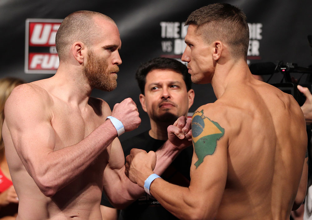FAIRFAX, VA - MAY 14: (L-R) Lightweight opponents TJ Grant and Carlo Prater face off after weighing during the UFC on Fuel TV official weigh in at Patriot Center on May 14, 2012 in Fairfax, Virginia. (Photo by Josh Hedges/Zuffa LLC/Zuffa LLC via Getty Images)