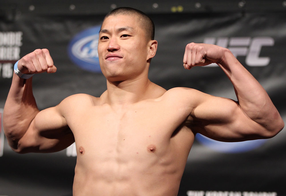 FAIRFAX, VA - MAY 14: Dongi Yang makes weight during the UFC on Fuel TV official weigh in at Patriot Center on May 14, 2012 in Fairfax, Virginia. (Photo by Josh Hedges/Zuffa LLC/Zuffa LLC via Getty Images)