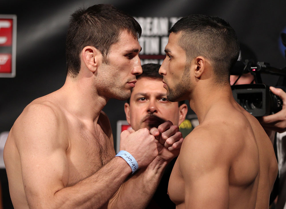 FAIRFAX, VA - MAY 14:  (L-R) Opponents Amir Sodollah and Jorge Lopez face off after weighing in during the UFC on Fuel TV official weigh in at Patriot Center on May 14, 2012 in Fairfax, Virginia.  (Photo by Josh Hedges/Zuffa LLC/Zuffa LLC via Getty Images)