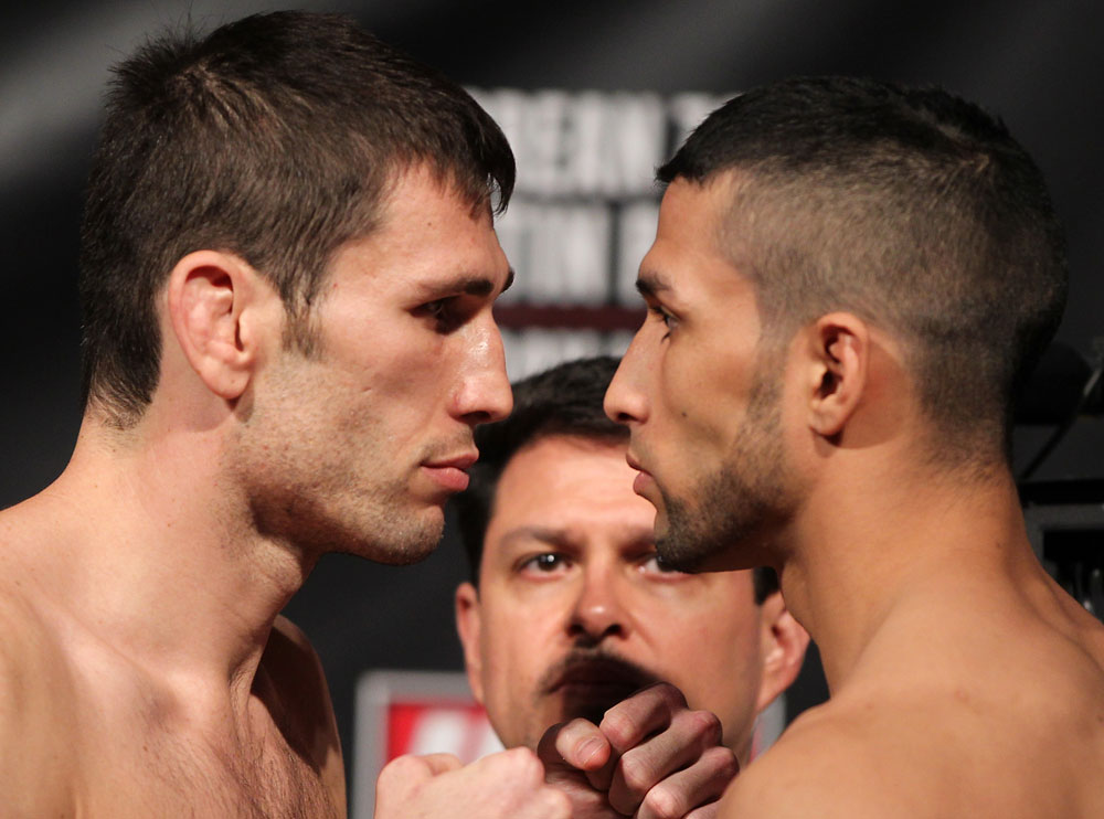 FAIRFAX, VA - MAY 14:  (L-R) Opponents Amir Sodollah and Jorge Lopez face off after weighing in during the UFC on Fuel TV official weigh in at Patriot Center on May 14, 2012 in Fairfax, Virginia.  (Photo by Josh Hedges/Zuffa LLC/Zuffa LLC via Getty Images)