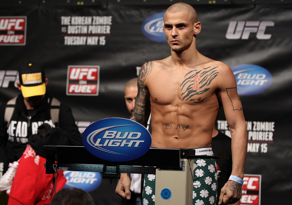 FAIRFAX, VA - MAY 14:  Dustin Poirier makes weight during the UFC on Fuel TV official weigh in at Patriot Center on May 14, 2012 in Fairfax, Virginia.  (Photo by Josh Hedges/Zuffa LLC/Zuffa LLC via Getty Images)