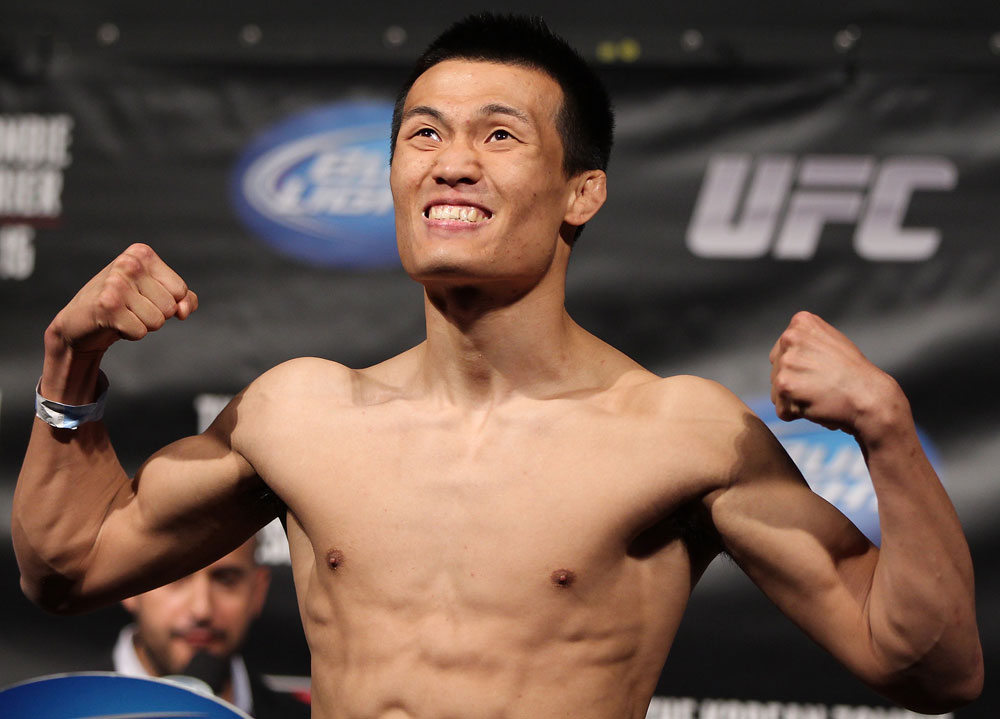 FAIRFAX, VA - MAY 14: "The Korean Zombie" Chan Sung Jung makes weight during the UFC on Fuel TV official weigh in at Patriot Center on May 14, 2012 in Fairfax, Virginia. (Photo by Josh Hedges/Zuffa LLC/Zuffa LLC via Getty Images)
