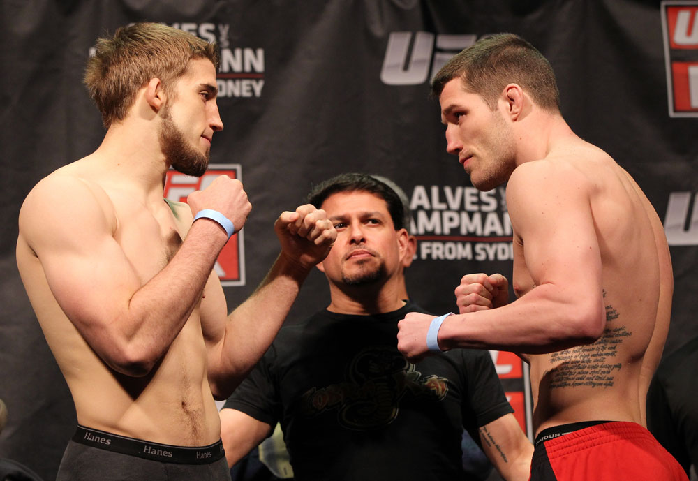 SYDNEY, AUSTRALIA - MARCH 02: (L-R) Welterweight opponents TJ Waldburger and Jake Hecht face off after weighing in during the UFC on FX official weigh in at Allphones Arena on March 2, 2012 in Sydney, Australia. (Photo by Josh Hedges/Zuffa LLC/Zuffa LLC via Getty Images) *** Local Caption *** TJ Waldburger; Jake Hecht